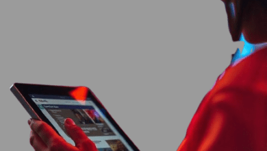 A person reading gadget tech news on a tablet